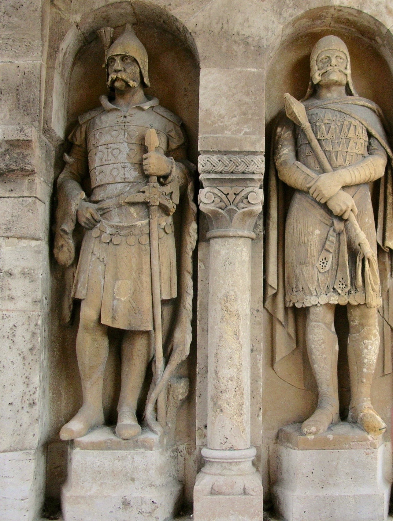 Statues dedicated to the fishermen who once defended the city walls. 