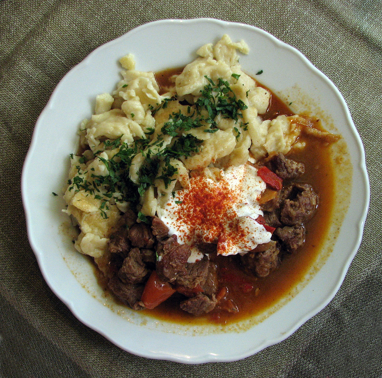 Hungarian Gulyás with a side of spaetzle. Photo from Wikipedia.