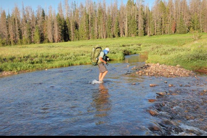 Getting to our second campsite was quite a challenge - Pat crosses the North Fork, Elk River. Photo by Paul Hedquist.