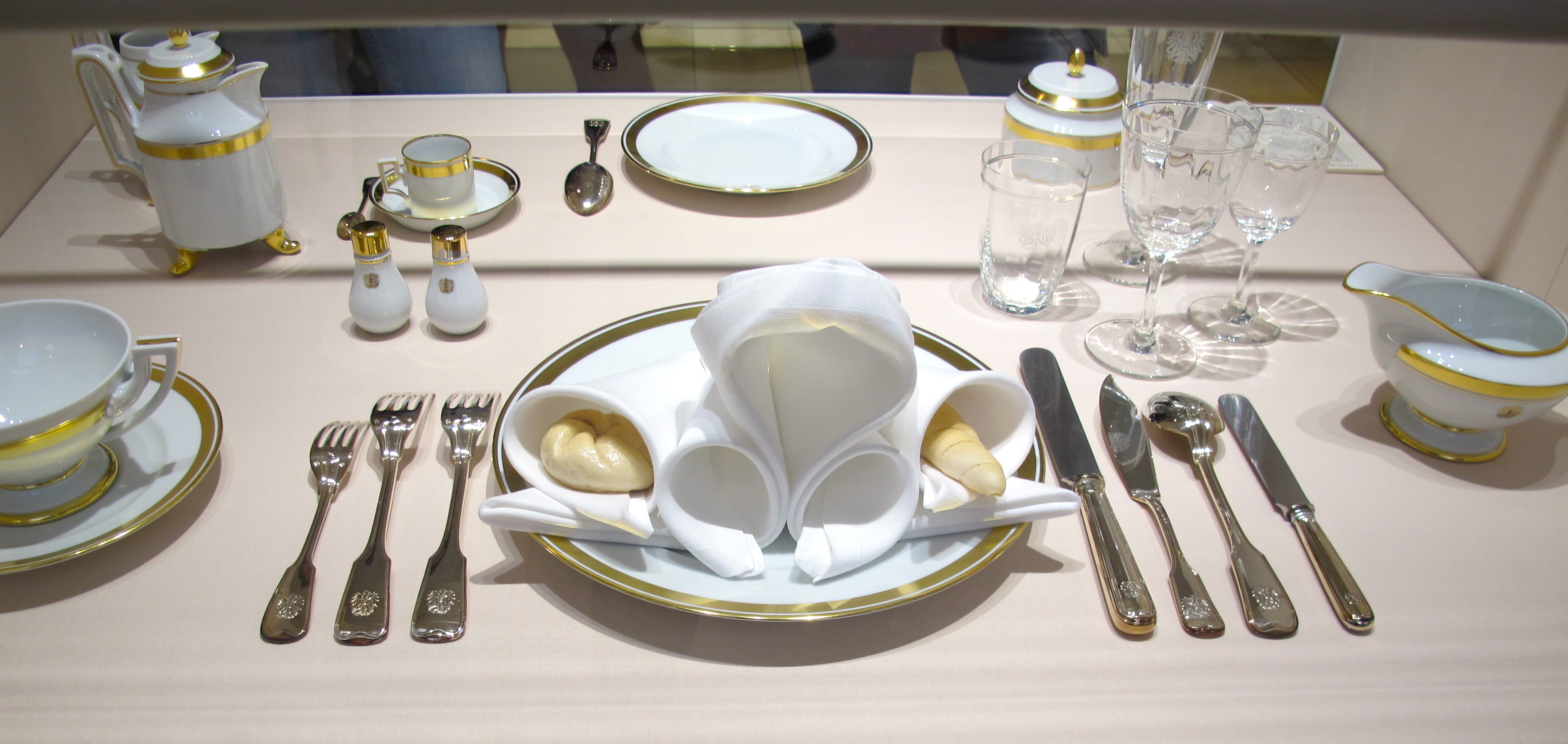 Habsburg table setting - the intricately folded napkin is so complicated, it was considered a state secret for many decades.