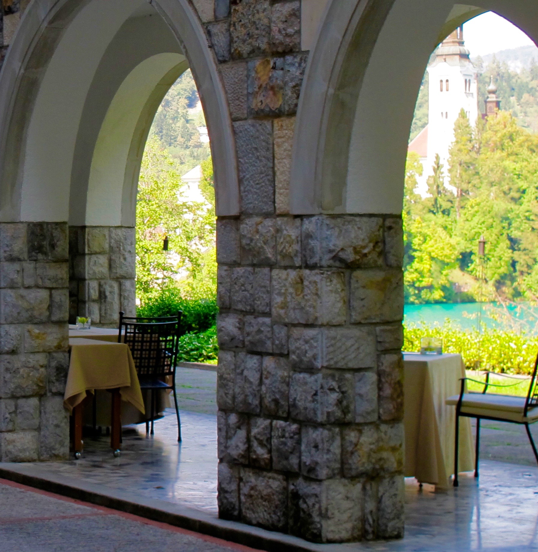 he long terrace at Hotel Vila Bled, overlooking the lake, offers a beautiful spot for dining and entertaining. 