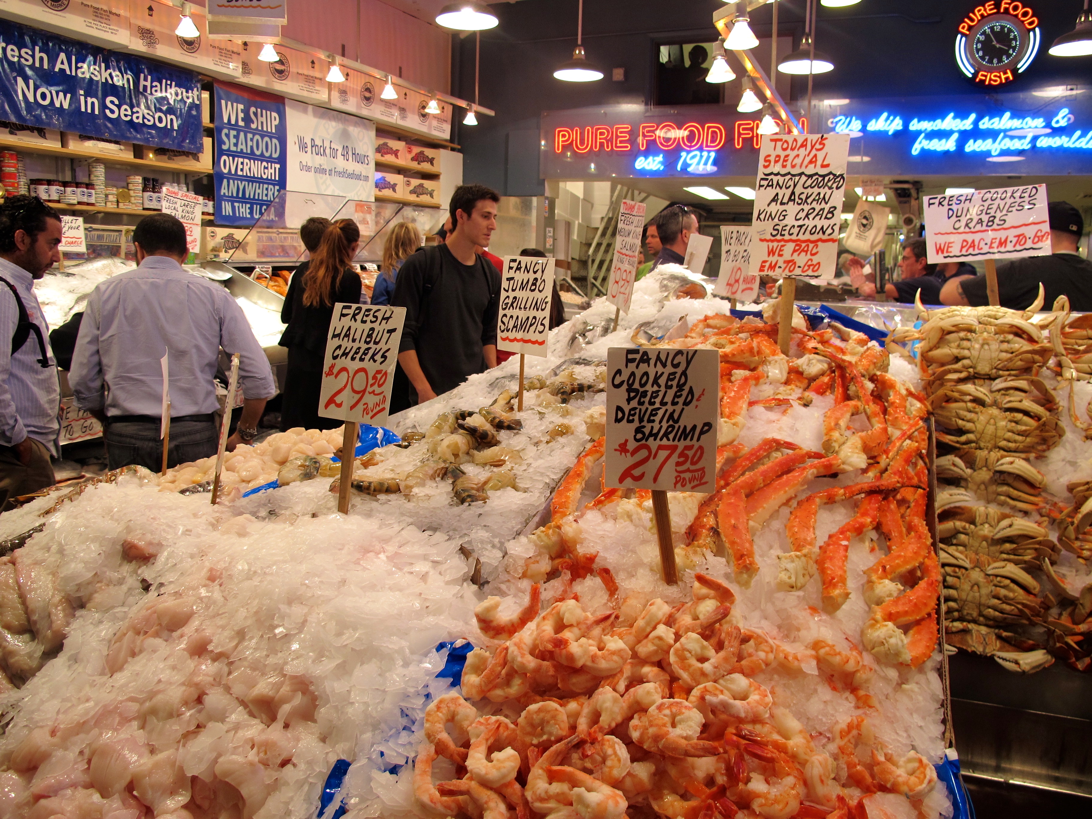 LOOK OUT! A Fish Fight could erupt at any minute at the Pike Place Market. Photo by Marla Norman.