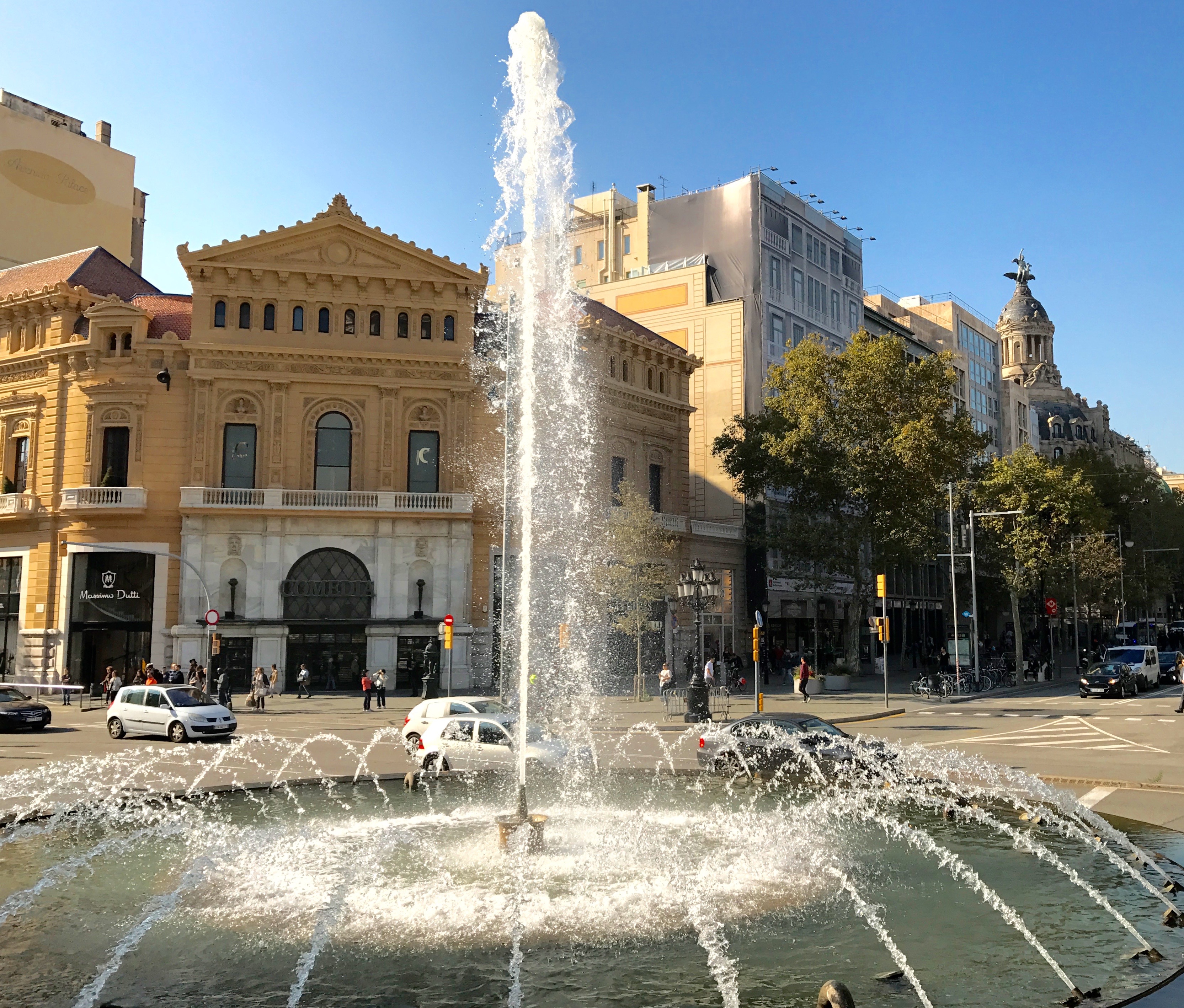 Beautiful fountains and high-end shopping at Passeig de Gràcia.