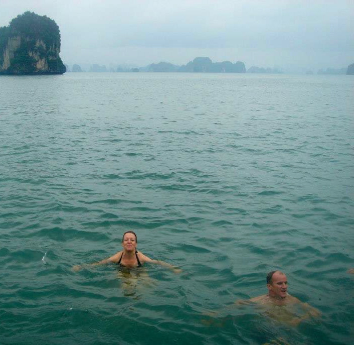 Cristina Mora and a fellow traveler swin the South China Sea. 