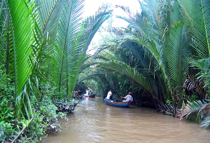 Muddy waters of the Mekong Delta. Photo by Cristina Mora.