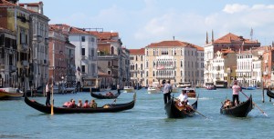 Gondolas, vaporettos and motoscafos zoom along the Venetian canals, scarcely avoiding collisions with one another. Photo by Marla Norman.