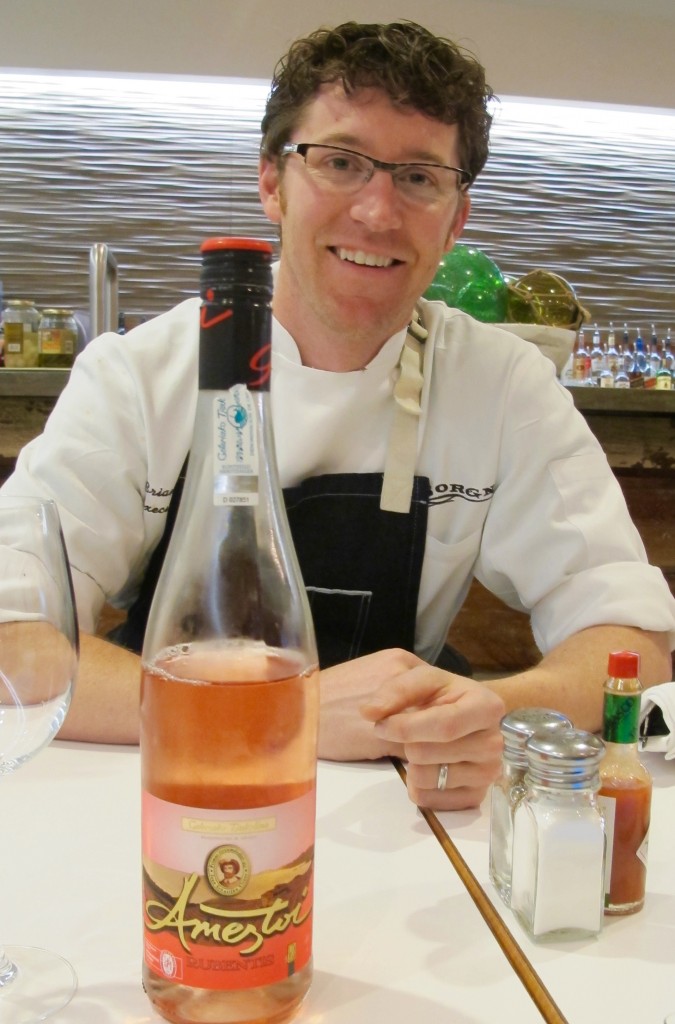 Chef Brian Landry shares a bottle of his favorite Spanish Rosé. Photo by Marla Norman.