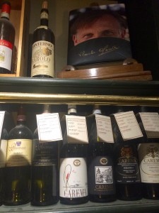 Shelves of select wines accompanied by books about their winemakers and actual samples of the winery terroir line the walls at Enoteca Pitti Gola e Cantina. Photo by Marla Norman.