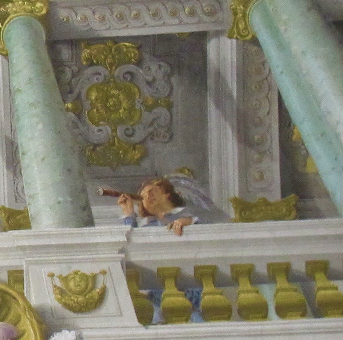 Close-up of angel with a spyglass. Photo by Marla Norman.