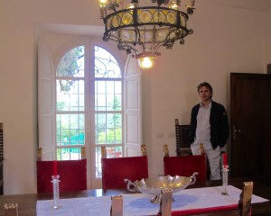 Vineyard tours and catered dinners can be arranged through the Trambusti Family. Here Giacomo Trambusti checks the villa’s formal dining room. Photo by Marla Norman.