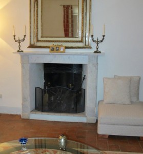 Fireplace in the split-level apartment. Photo by Marla Norman.