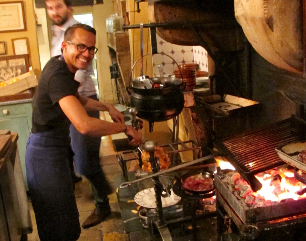 Sizzling meats and a cauldron of soup at La Tupina. 