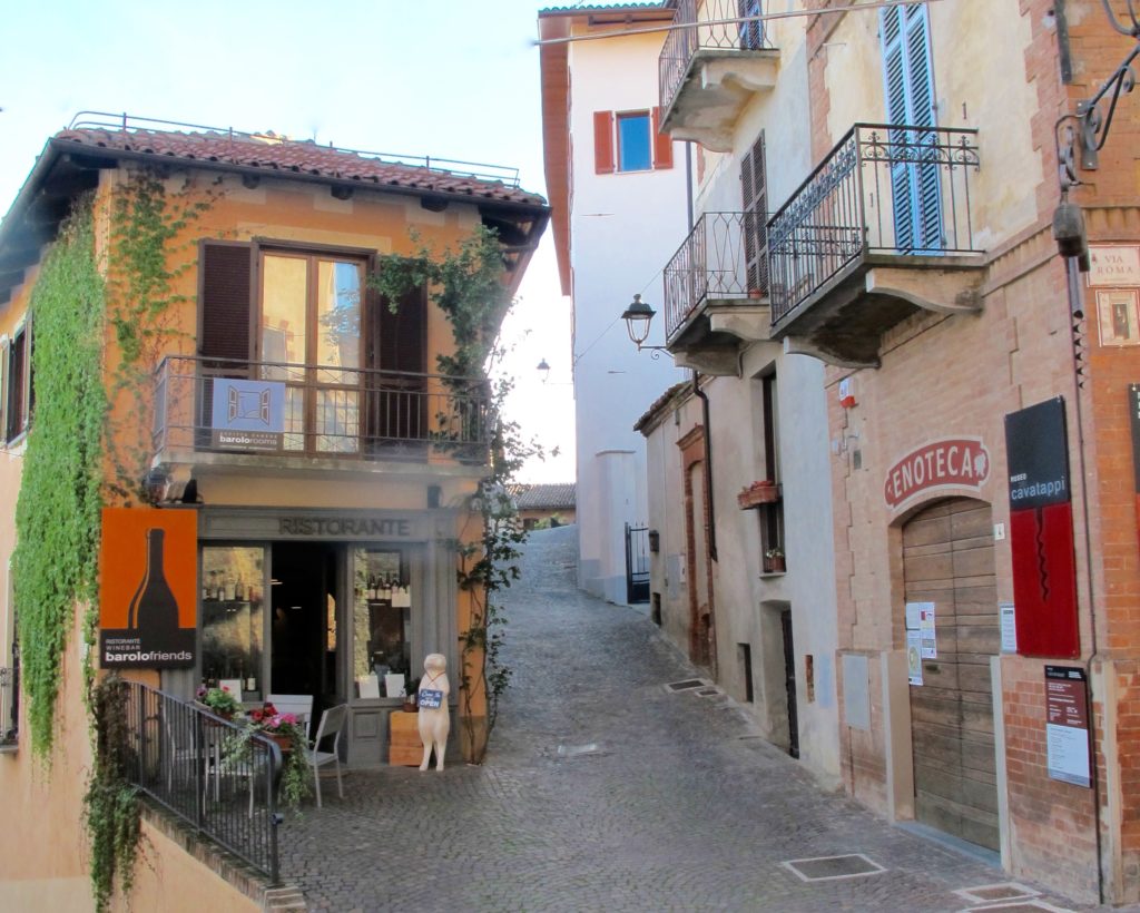 Inviting corner cafe tucked along the cobblestone streets of Barolo.