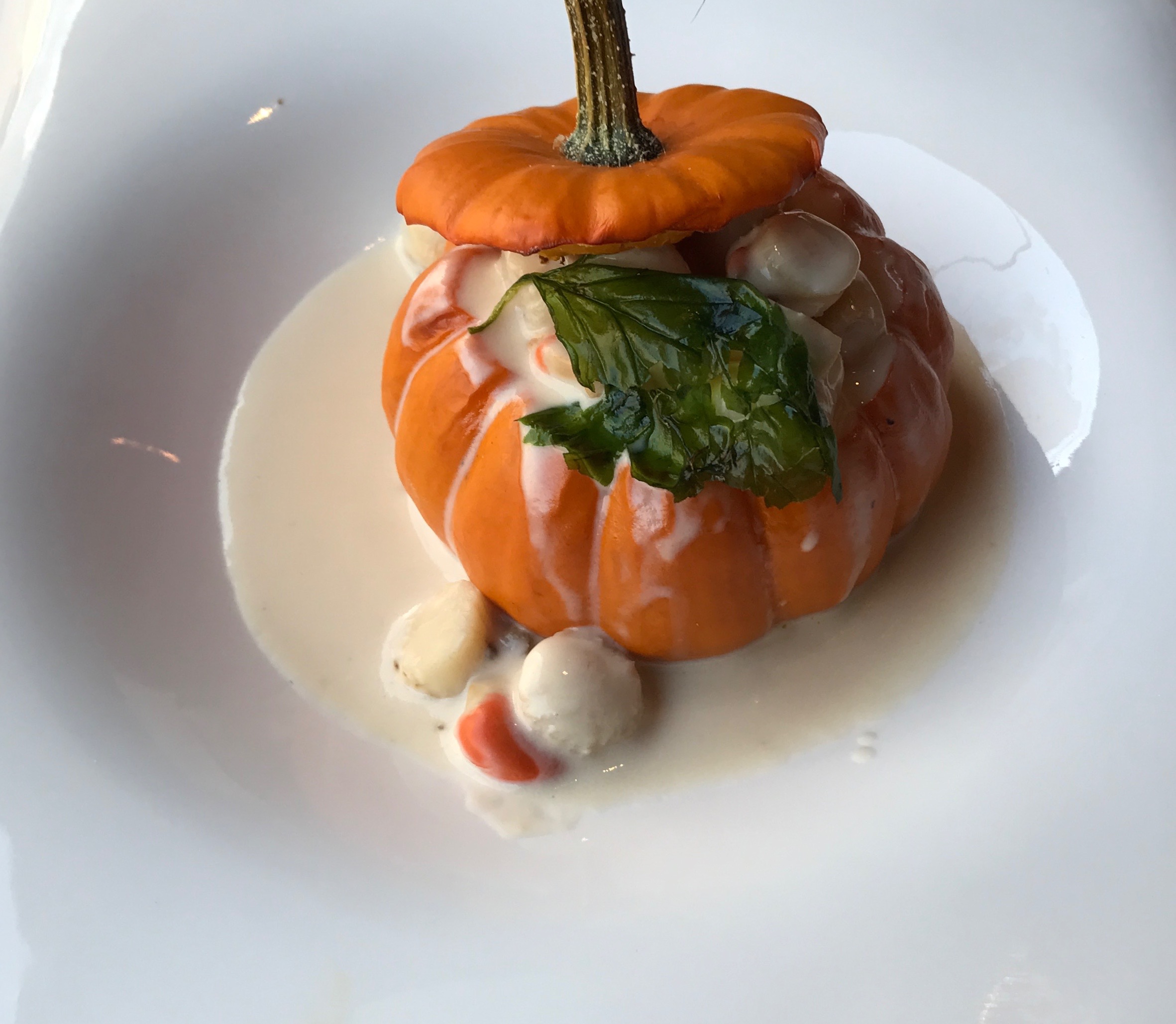 Luscious Pumpkin soup with scallops.