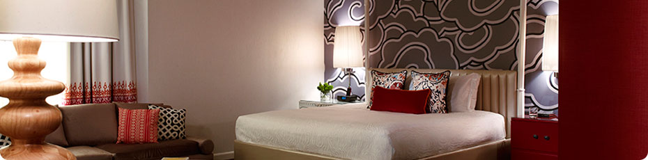 Frette linens top plush pillowtop beds in Hotel Moncaco guest rooms. Photo courtesy of Hotel Monaco.