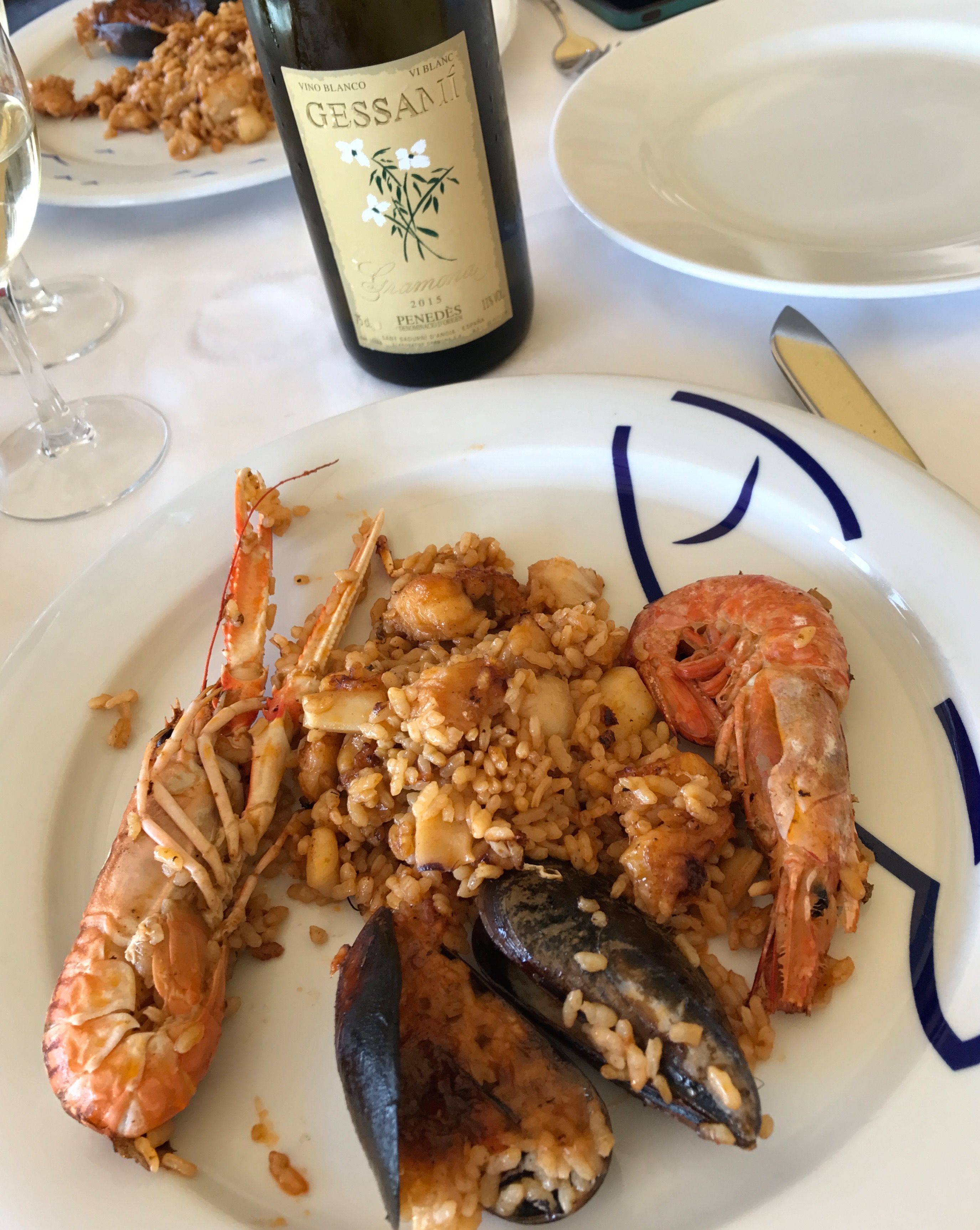 Catalan Paella with a glass of white Penedès. 